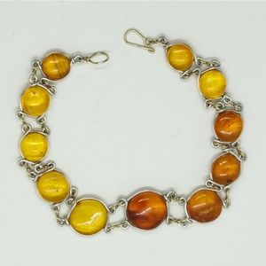 Silver bracelet with Baltic amber.